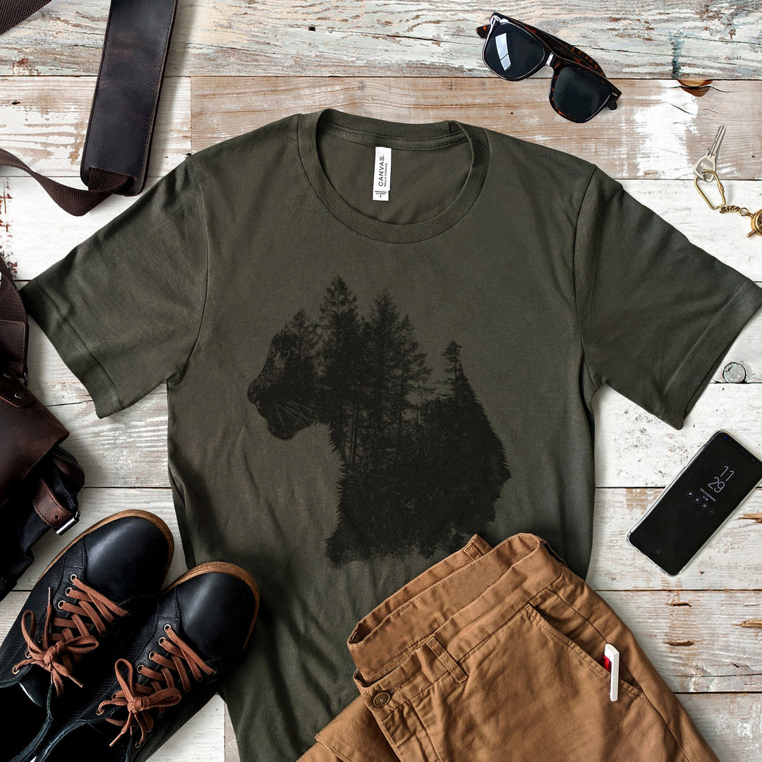 a t - shirt that has a picture of a bear on it