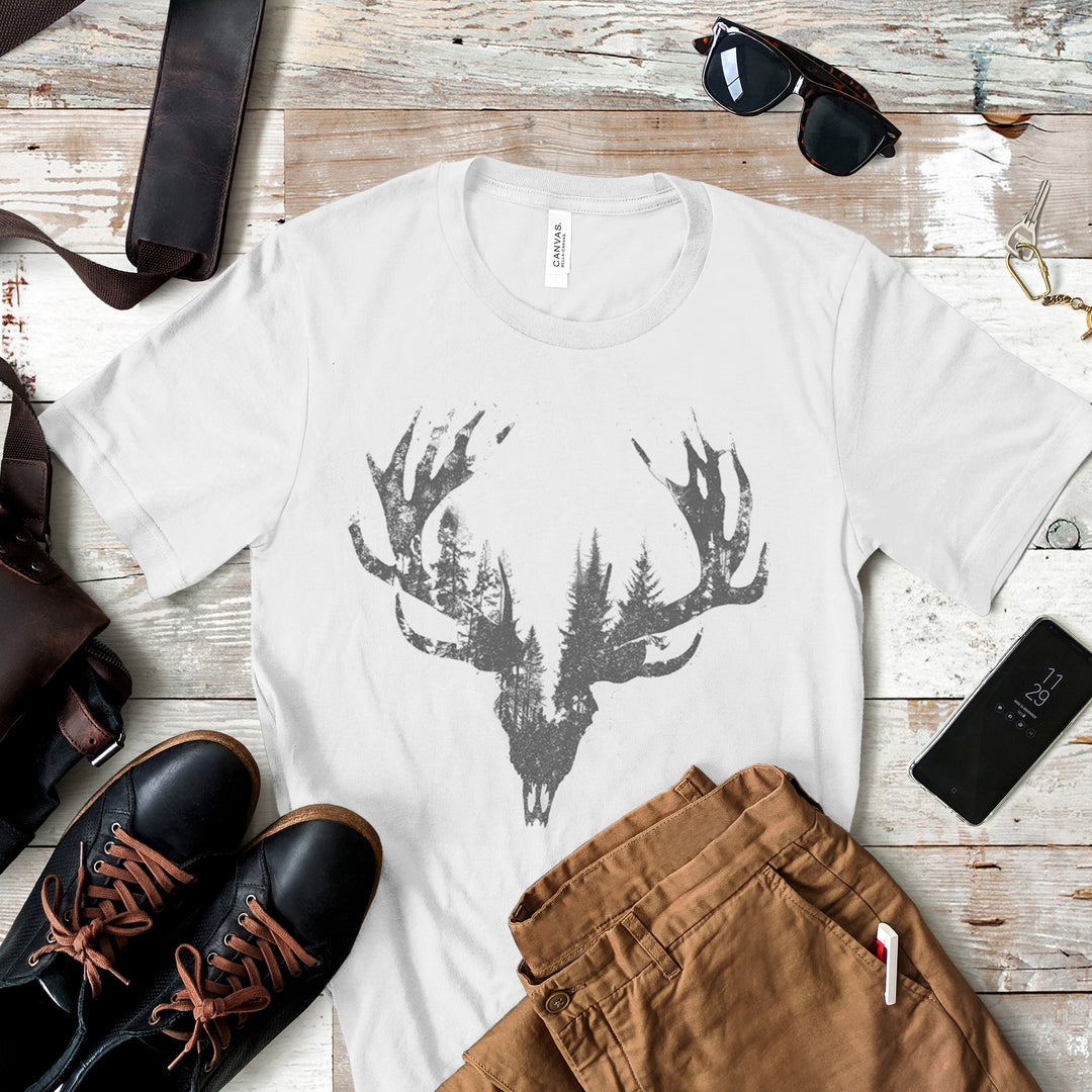 a white t - shirt with a deer head on it