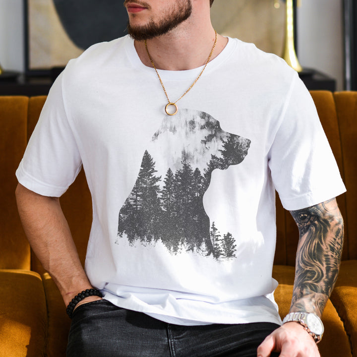 a man sitting on a couch wearing a bear t - shirt