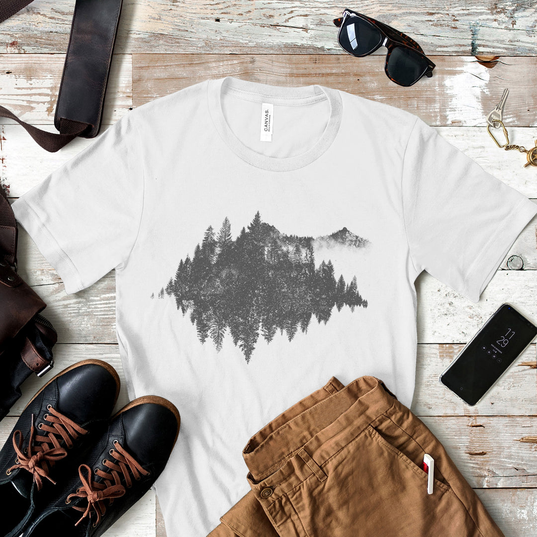 a white t - shirt with a picture of a mountain